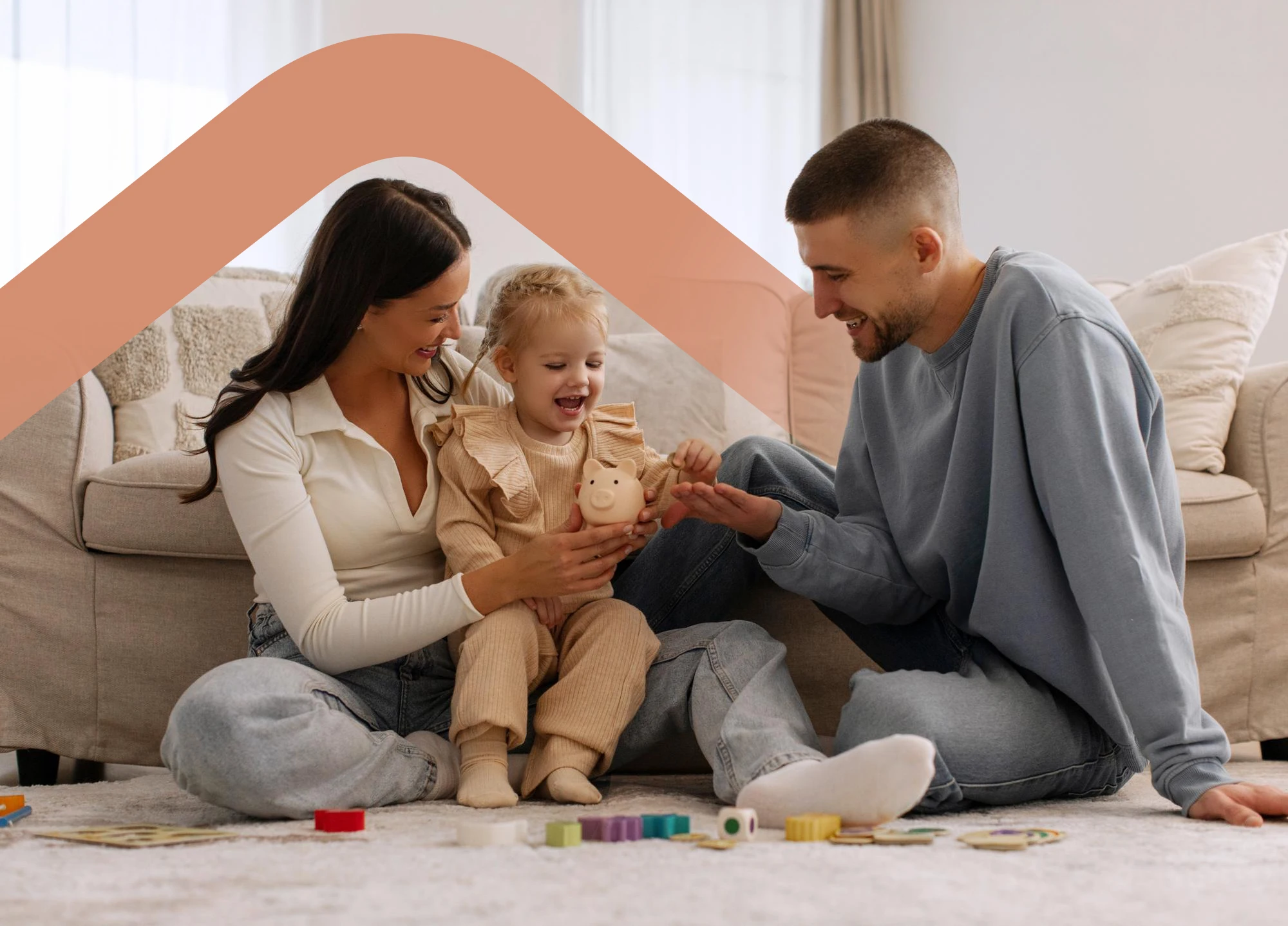 A parent, child, and therapist sitting together on the living-room floor during a session