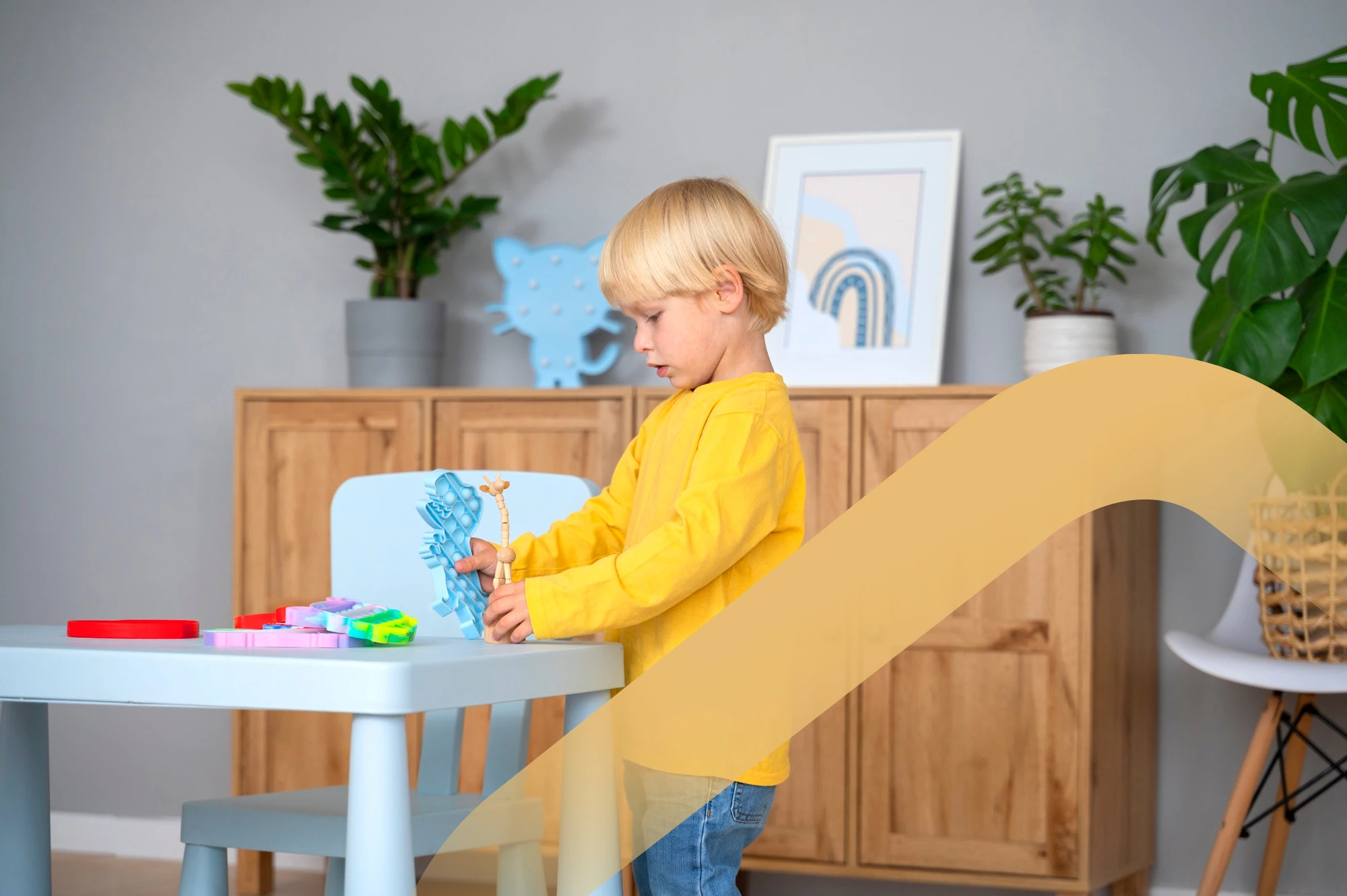 A child learning at the kitchen table in a bright family home